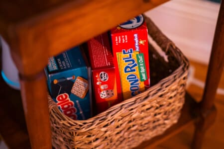Candy basket filled with colorful treats sitting on a shelf, ready for kids in a family-friendly Cleveland vacation rental.