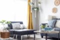 Serene and modern living room with minimalist décor, calming neutral tones, and natural light for a relaxing, zen-inspired atmosphere.