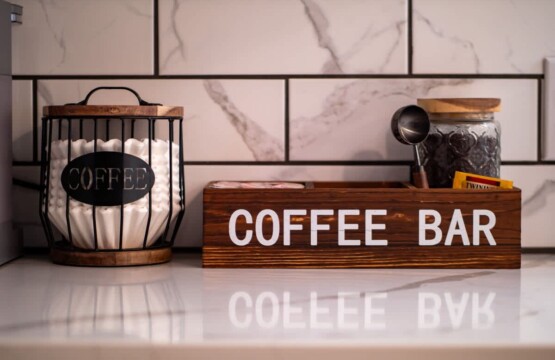 Thoughtfully stocked coffee bar in a vacation rental with coffee maker, mugs, and morning essentials for guests
